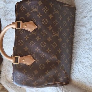 Louis Vuitton Classic Brown Monogram Satchel With Complimentary YSL Umbrella.